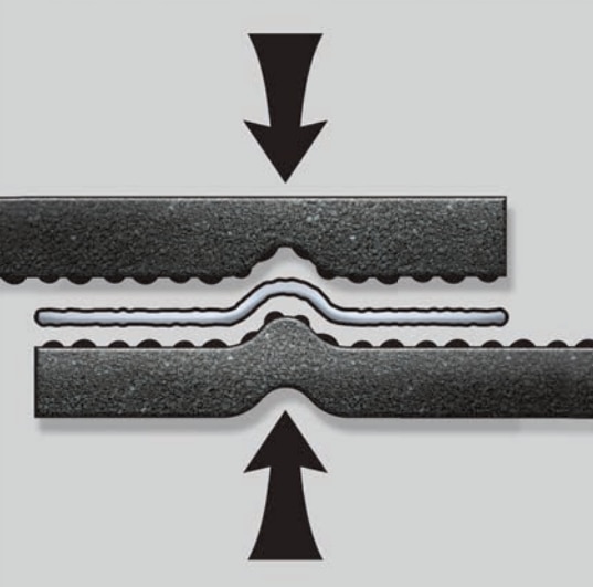 Shows the mechanical attachment of LayerLock on Timberline HDZ shingles