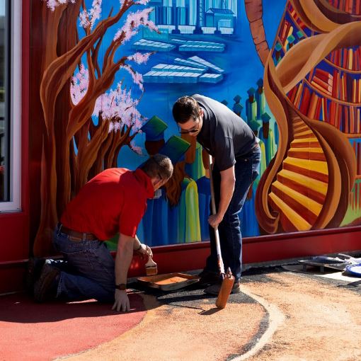 GAF employees helping community by painting coatings