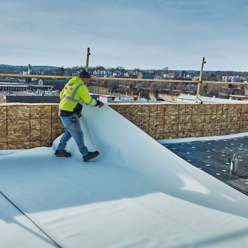 GAF certified contractor installing commercial roofing materials