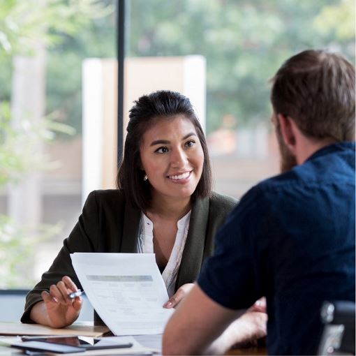 Man speaking with financial counselor about available options as a GAF employee