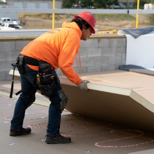 Contractor using GAF EnergyGuard NH Polyiso Insulation to make installation easier 