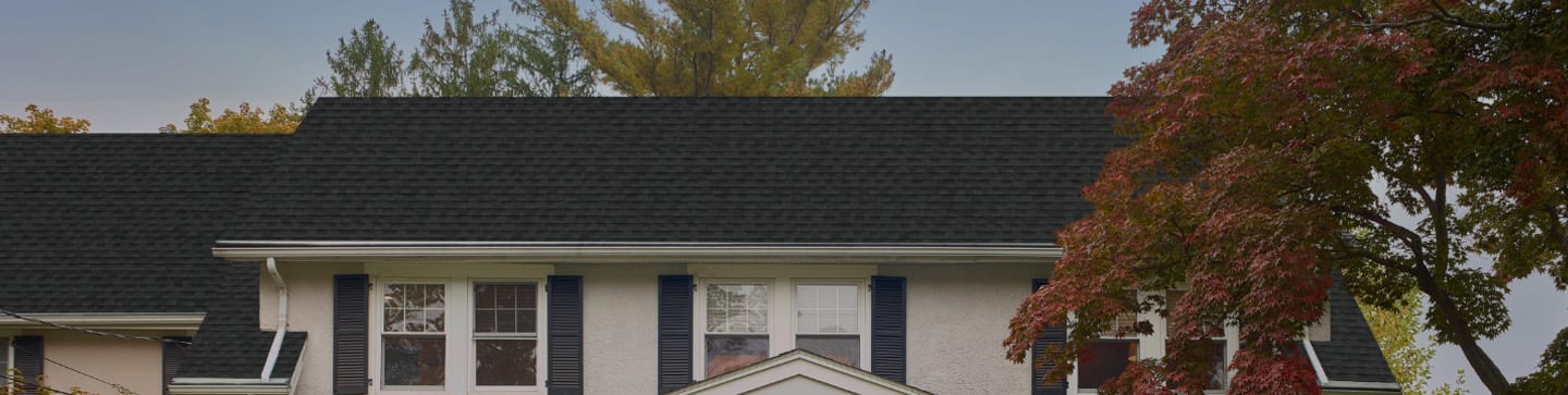 House with GAF algae resistant roof shingles