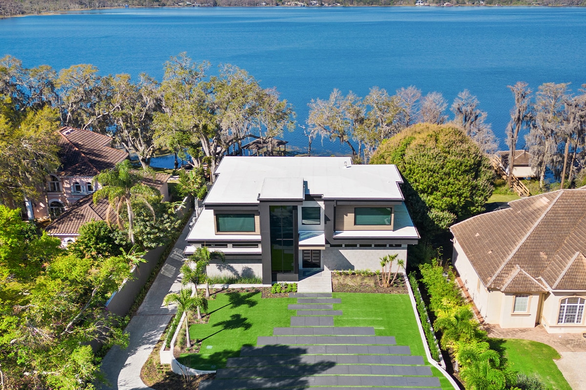 Lake Sheen Estate home with a flat GAF roof