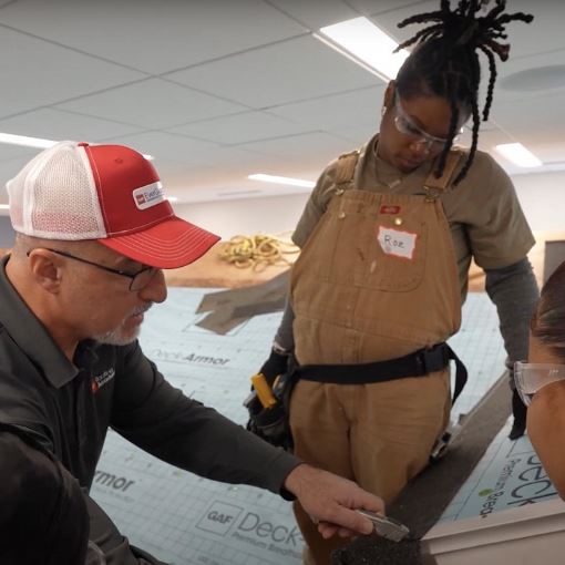 GAF Roofing Academy trainers teaching trades to new roofers