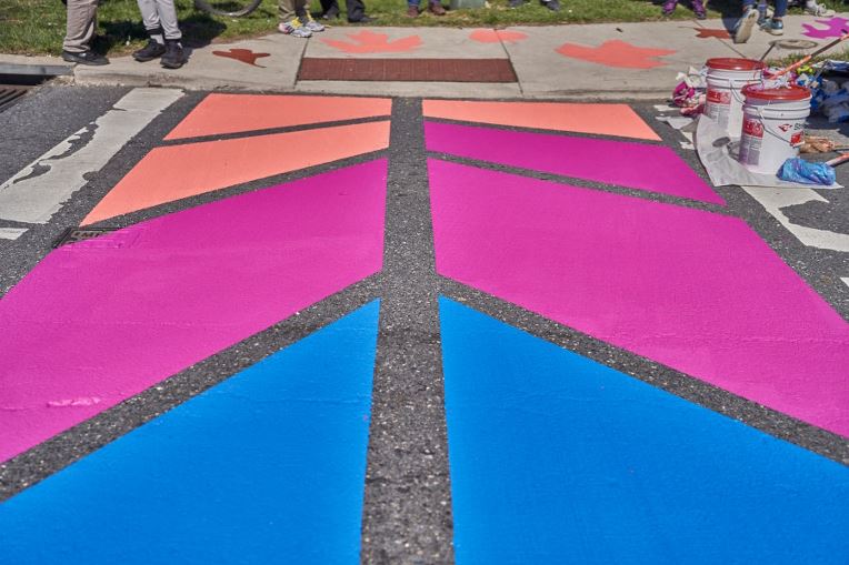 StreetBond DuraSheild pavement coating design in bright colors on asphalt.