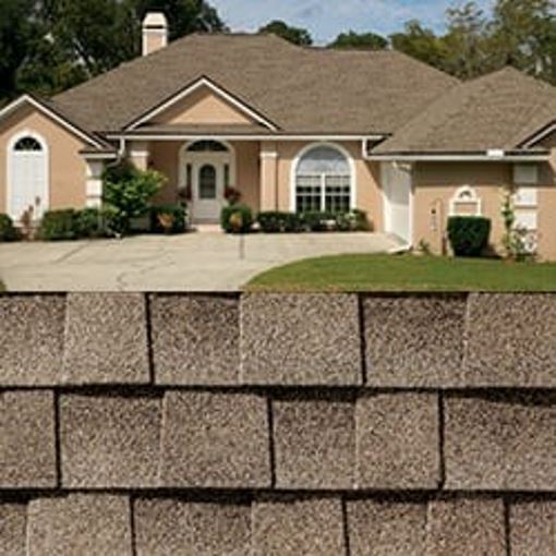 GAF Timberline HDZ driftwood shingle closeup with sample product image on a beige house.