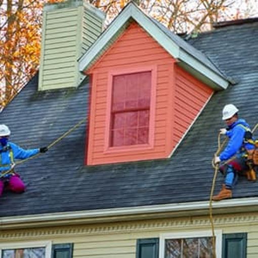 Highlighting a dormer roof on a home, which adds space and light to a top floor or attic.