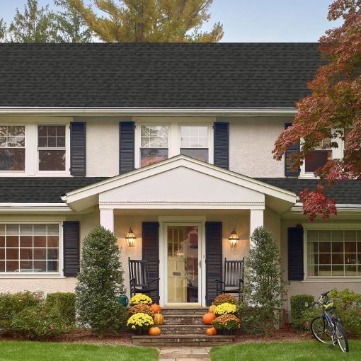 White home with Timberline HDZ roofing shingles