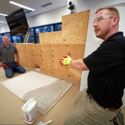 GAF employees training roofers at CARE contractor training center