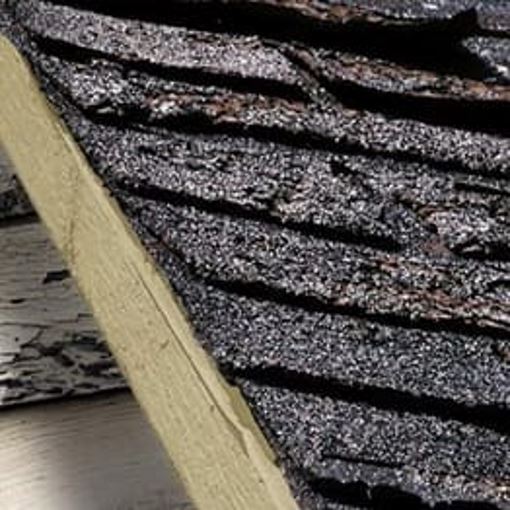 damaged roof decking with asphalt shingles