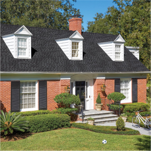 Timberline HDZ: Brick home with black Timberline HDZ shingles